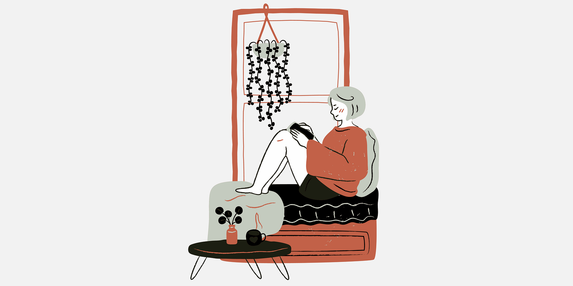 Woman sitting on a window seat reading